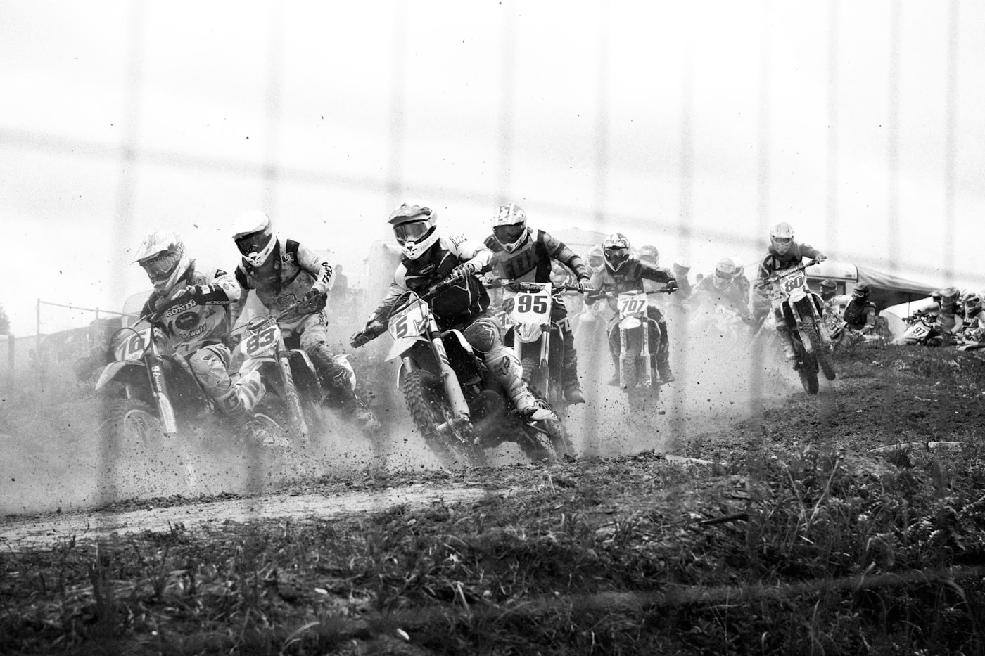 Riders bunched together in an early local race
